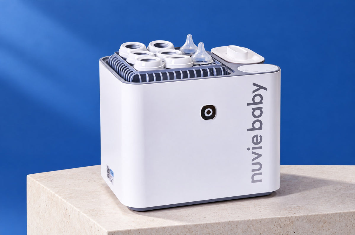 The nuviebaby Clean Max loaded with bottle parts.