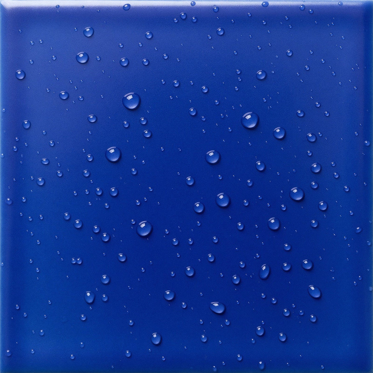 Close texture photo behind the cobalt close card.